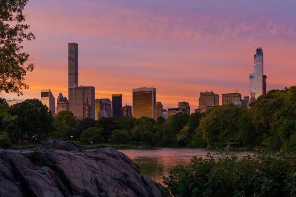  Golden Hour view from The Lake in Central Park NYC of Billionaires Row