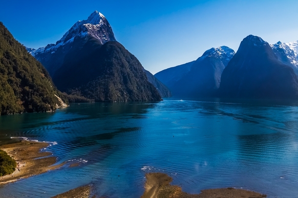  Inhabitants  visitors per year I too took a picture of New Zealands Milford Sound 