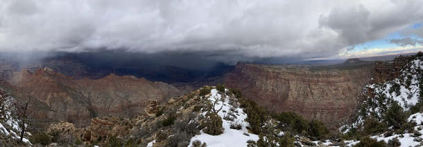  panorama of a storm rolling through the Grand Canyon