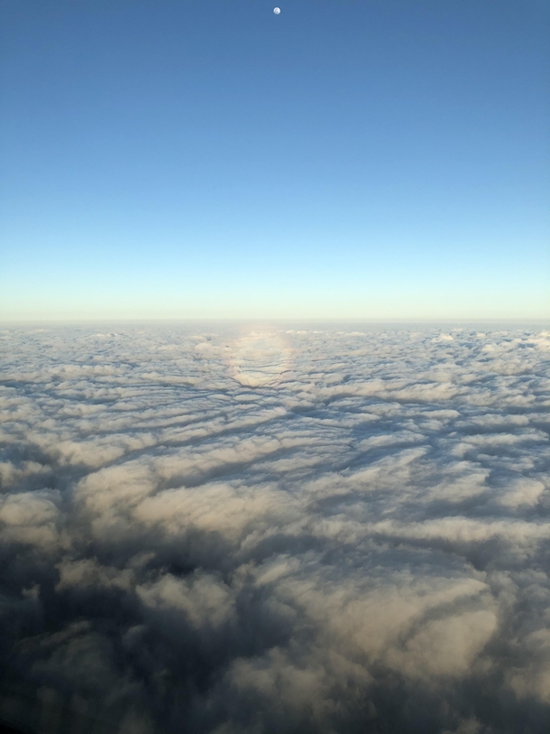  Rainbow  Moon while climbing above the clouds