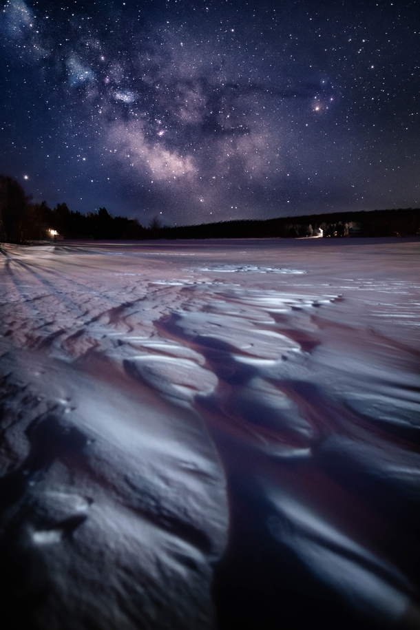  The Milky Way over a frozen lake in rural Quebec