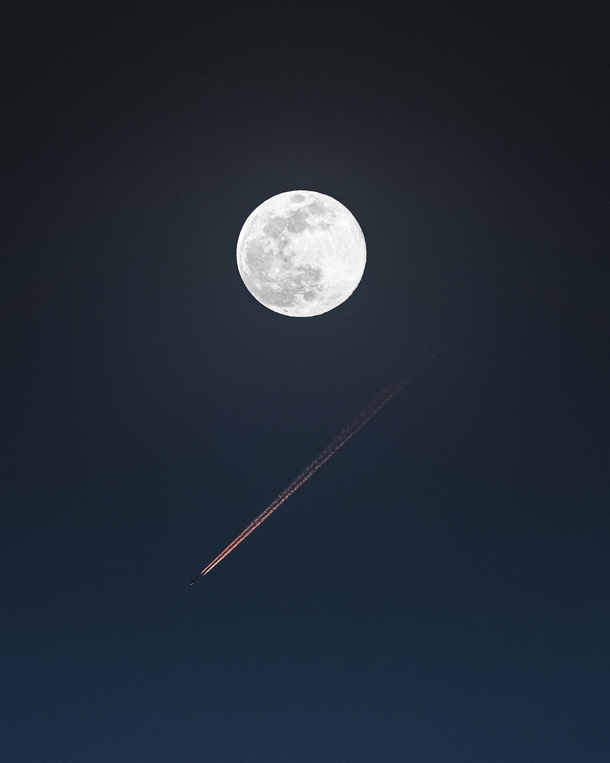  the recent super moon with a plane