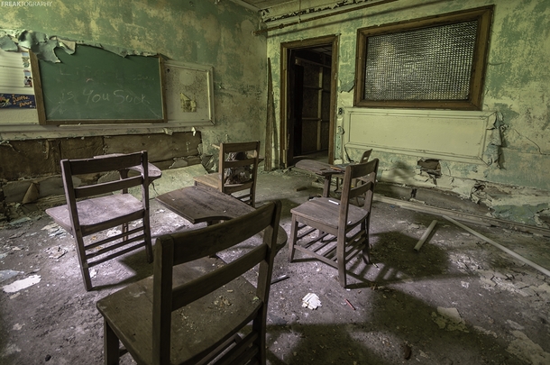 A badly decayed classroom found in the basement of an abandoned church OC X