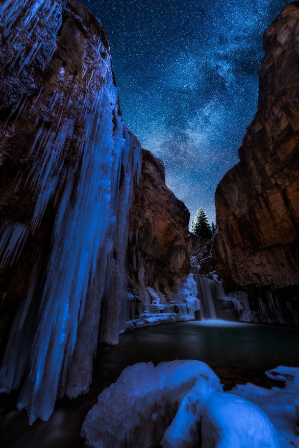 A beautiful frozen waterfall beneath a blanket of stars - Lime Creek Falls San Juan National Forest Colorado  Photo by Matt Payne