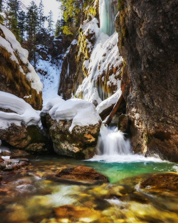 A beautiful stream at the end of winter in Gozd Martuljek Slovenia 