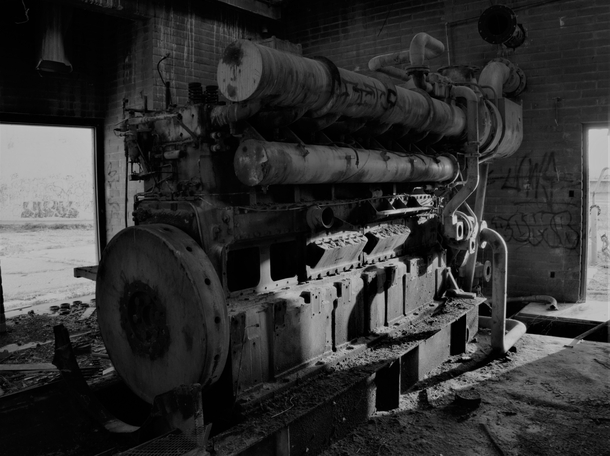 A big ol motor in an abandoned water treatment plant