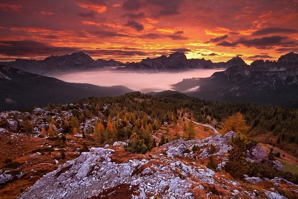 A blazing autumn morning on Falzarego Pass in the Dolomites Italy  Photo by Daniel eicha