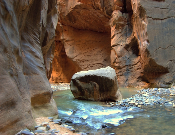 A boulder sits in the Virgin River at Zion National Park UT Taken last week on my phone 