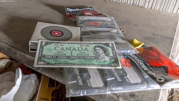 A Canadian Centennial Dollar bill found in excellent condition in an abandoned house in Ontario oc   