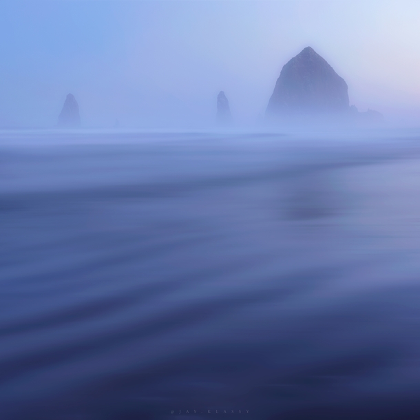A cold and foggy sunrise at Cannon Beach This is a  second long exposure of the fog and water moving across the beach InstagramJayKlassy