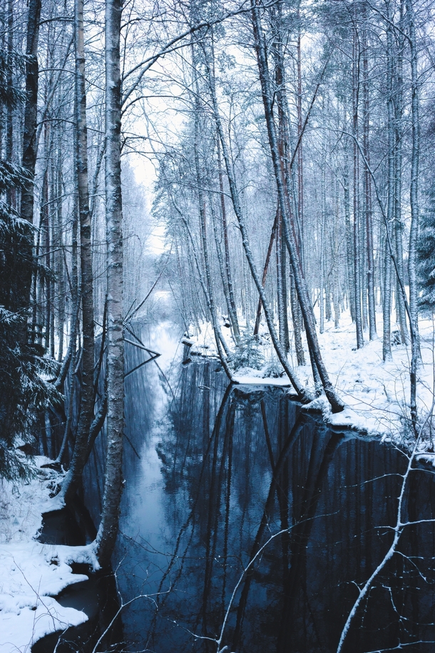 A cold river flowing through a scenery of magic Photo taken in Central Finland 