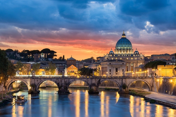 A colorful sunset over Vatican City and the St Peters Basilica in Rome  by Elia Locardi