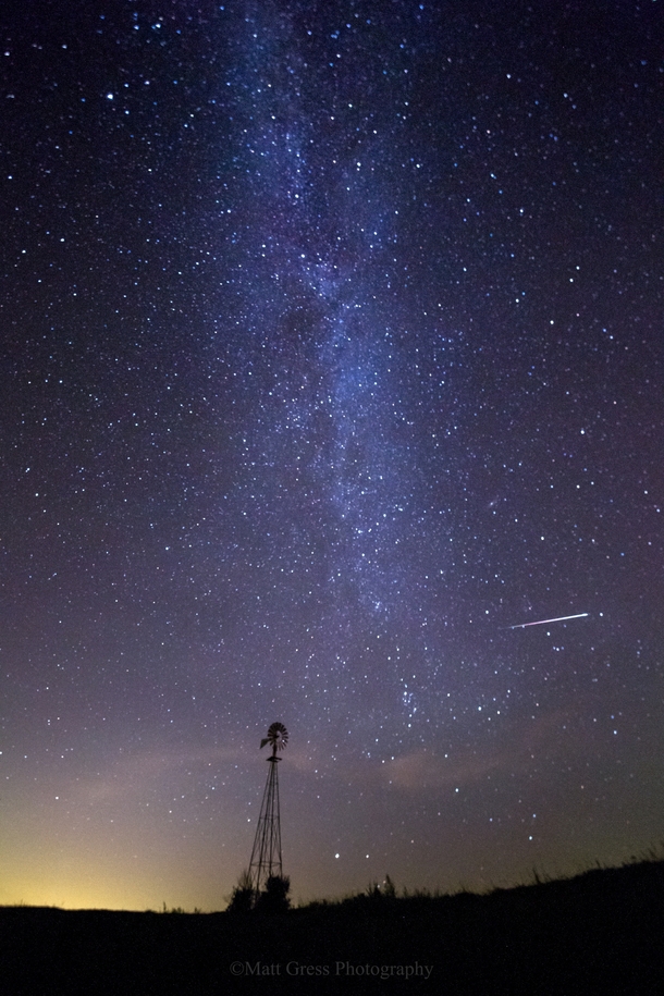 A few stars a meteor and a windmill Near Otoe Nebraska 