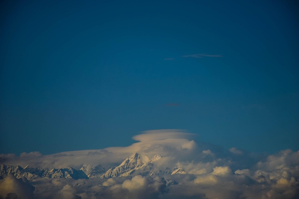 A glimpse of Mt Gaurishankharm seen hiding amidst the cloud from Kathmandu Valley OC 