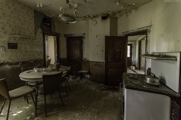 A kitchen stuck in time inside an abandoned house in
