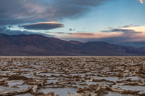 A lenticular cloud looms over the Panamint Range during sunrise Death Valley CA OC 