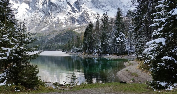 A little bit of snow at Eibsee at the foot of the Zugspitze Bavaria Germany 