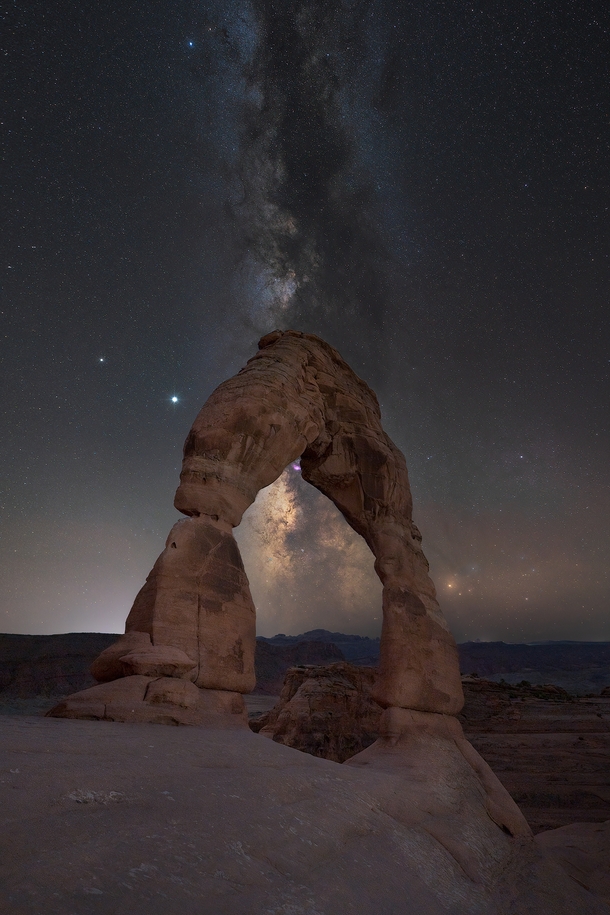 A magical night under the stars with the sound of the howling coyotes at Delicate Arch Utah