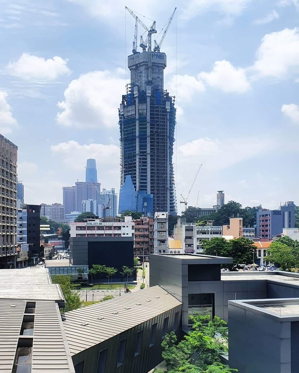 A  meters mega-tall skyscrapers under construction in the heart of the city Kuala Lumpur