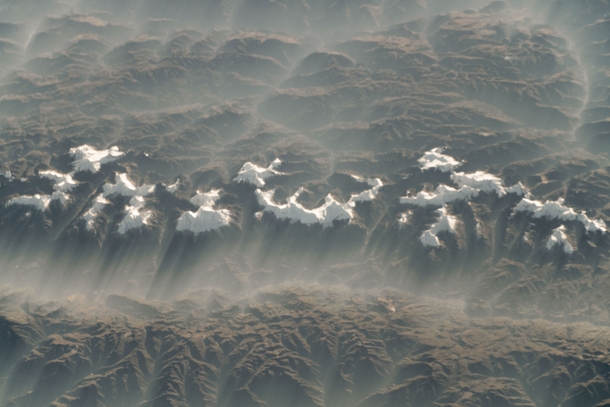A Misty Morning in the Mountains A glorious winter morning view greeted astronauts as they passed over the rugged peaks of Perus Cordillera Blanca -- Earth photographed on  May  from the International Space Station Photo credit National Aeronautics and Sp