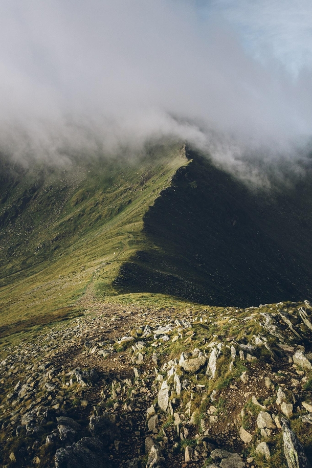 A moody morning looking up at Helvellyn from Swirral Edge Lake District UK 