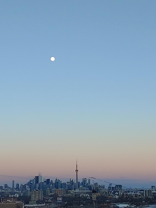 A nice full-ish moon in the evening Toronto sky