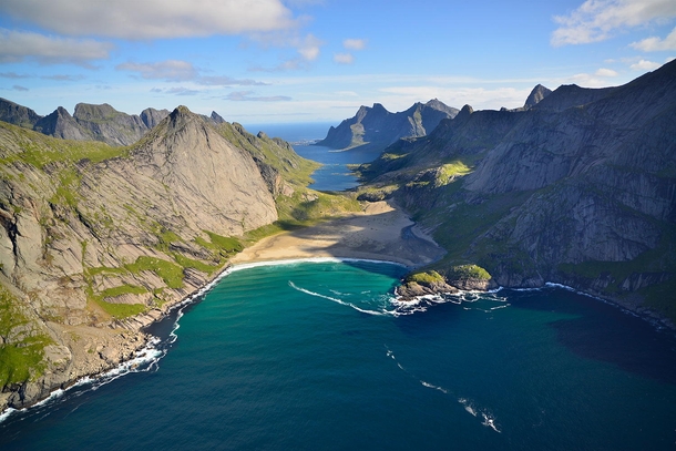 A Norwegian fjord with a beautiful sheltered beach  photo by Andre Ermolaev