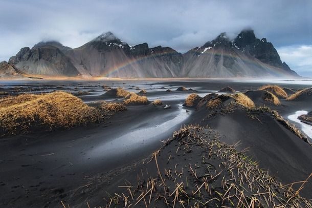 A rainbow at Vestrahorn Iceland  by Piriya Wongkongkathep