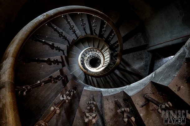 A rather nice staircase in an abandoned Insane Asylum 