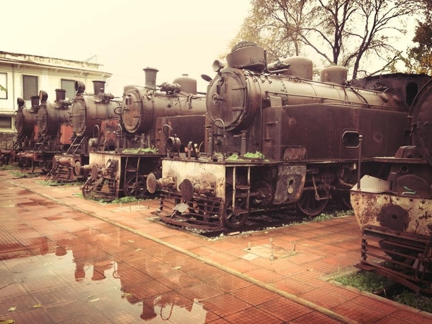 A row of abandoned engines in Vlos Greece by Eve Tokens  x-posted rSteamPorn