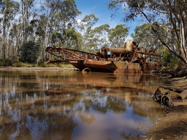 A s dredge and dragline once used for mining gold 