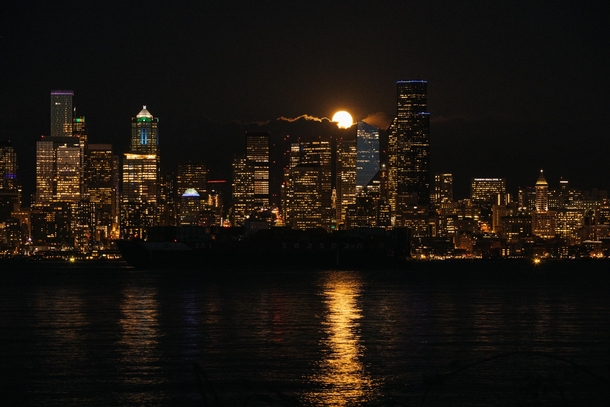 A Shadow Freighter and the Shiny Moon Downtown Seattle WA - taken by my sister Zo Burchard
