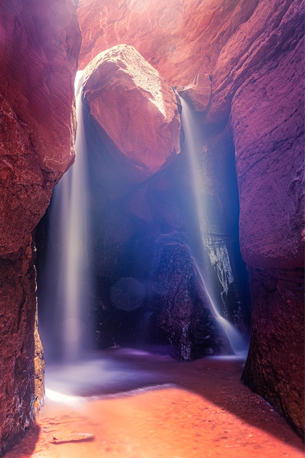 A slot canyon waterfall in Utah 