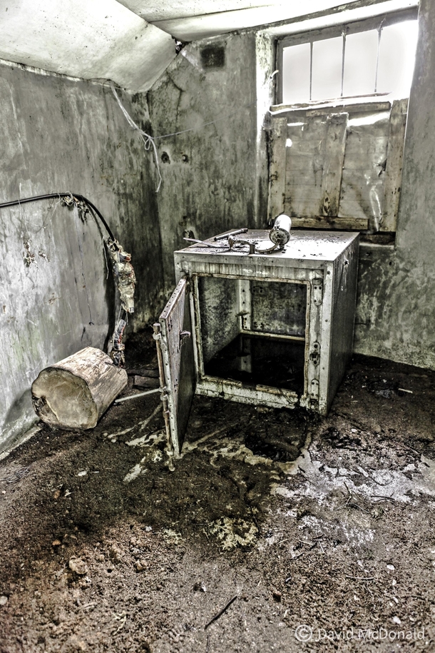 A small fridge left behind in an abandoned building on a farm just outside of Moffat Scotland explored in  on a family vacation