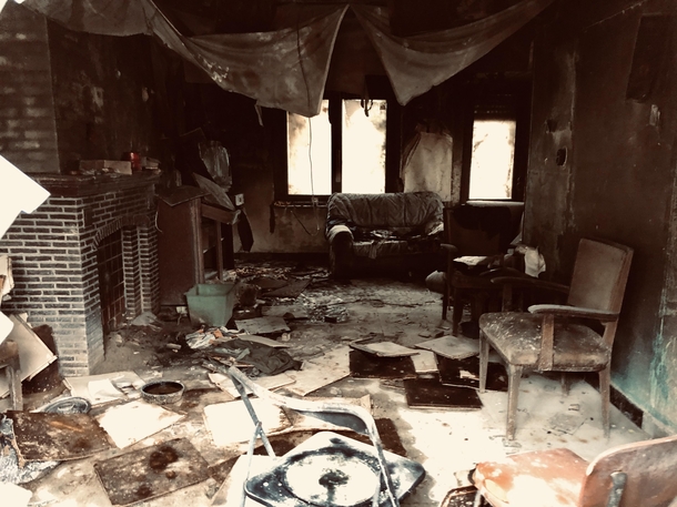 A small living room completely destroyed by fire This house was abandoned for many years but the fire was just a few months ago Doel Belgium