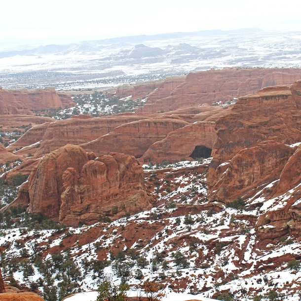 A snowy Moab at Arches National Park being cold has never looked so warm 