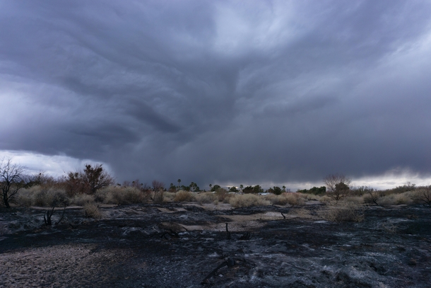 A storm cell meets a charred landscape in Henderson NV 