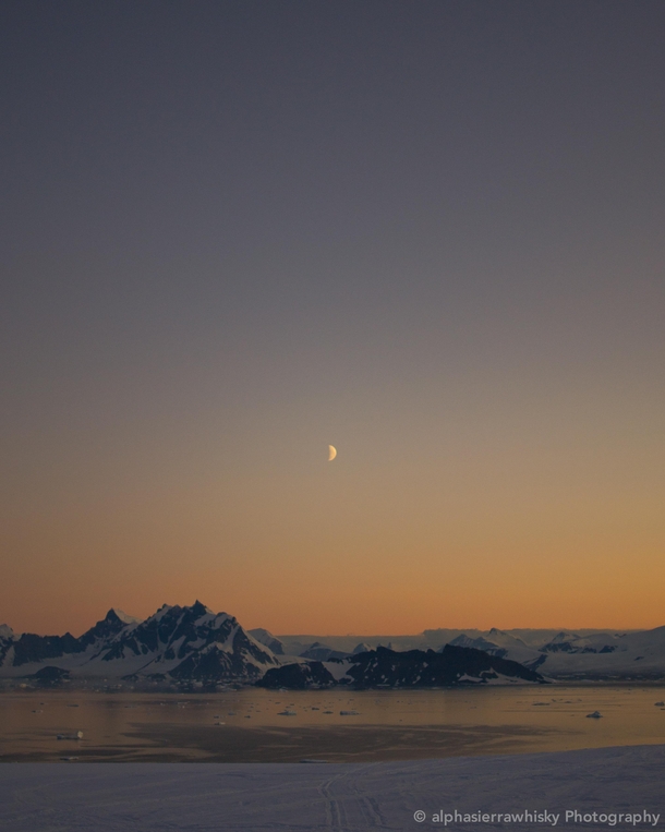 A view of the Arrowsmith Peninsula from Adelaide Island Antarctica Its nice to see the orange hue of twilight starting to come back after hr daylight for the last  weeks 