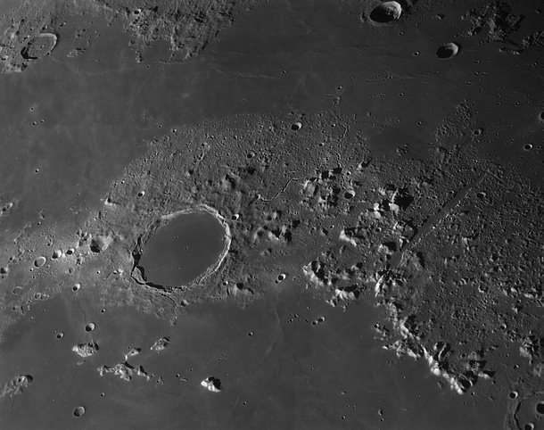 A view of the Lunar Alps and the km mi wide Plato crater 