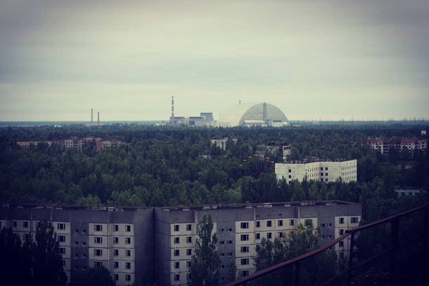 A view of the Vladimir I Lenin NPP Chernobyl NPP from the roof of a  story apartment block in Prypiat Ukraine Image taken th Aug 