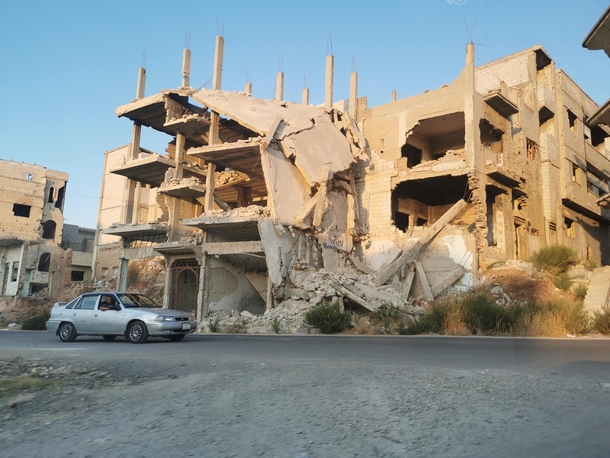 Abandoned apartment complex in Homs affected by war