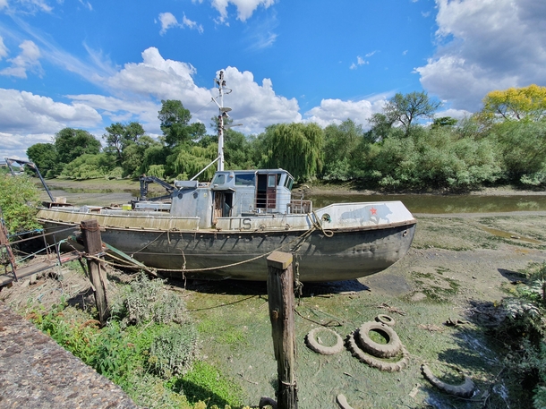 Abandoned boat along the Thames
