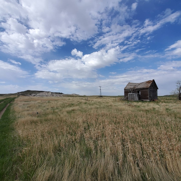 Abandoned building along the trail to White Butte highest natural point in North Dakota USA 