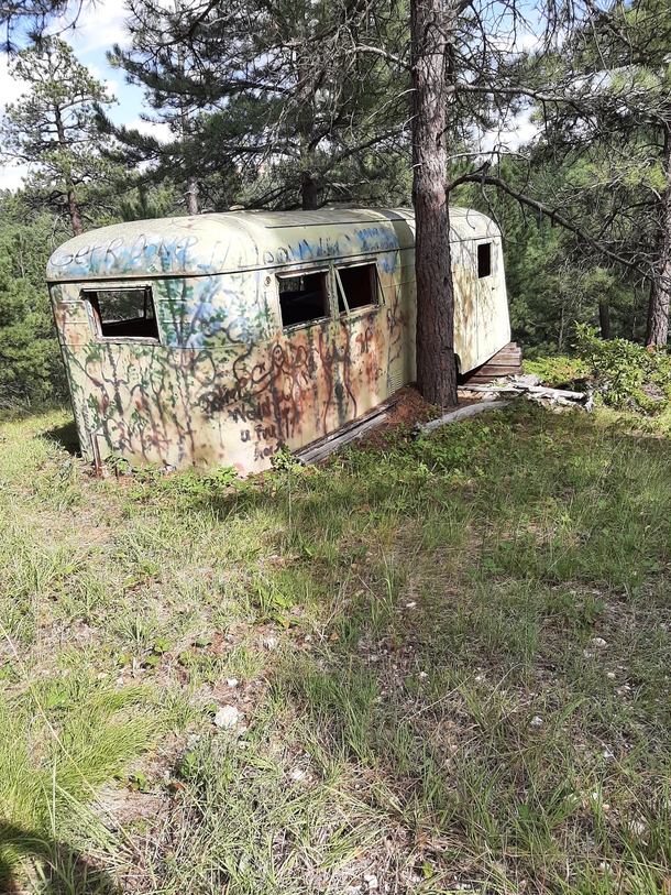 Abandoned camper hidden in the Black Hills of SD