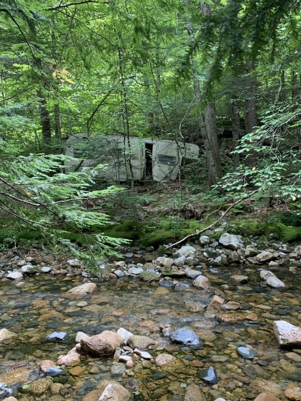 Abandoned camper in the woods of New Hampshire