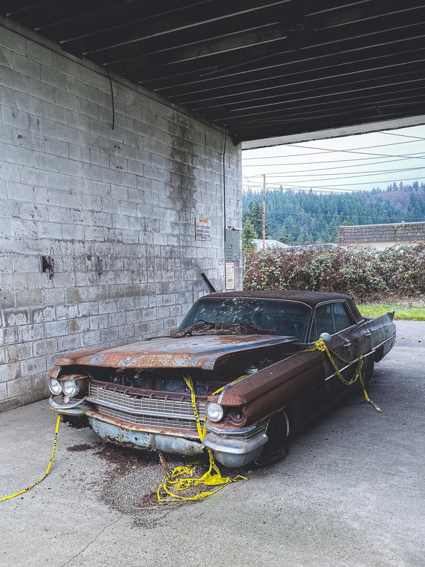 Abandoned car in an abandoned car wash Olympic Penninsula WA