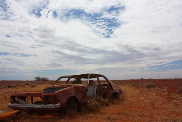 Abandoned car somewhere on the road to Coober Pedy central Australia 