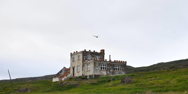Abandoned castle-like farm in Iceland Must have had nests nearby as the birds would swarm overhead and attack us when we tried to get any closer pretty terrifying actually 