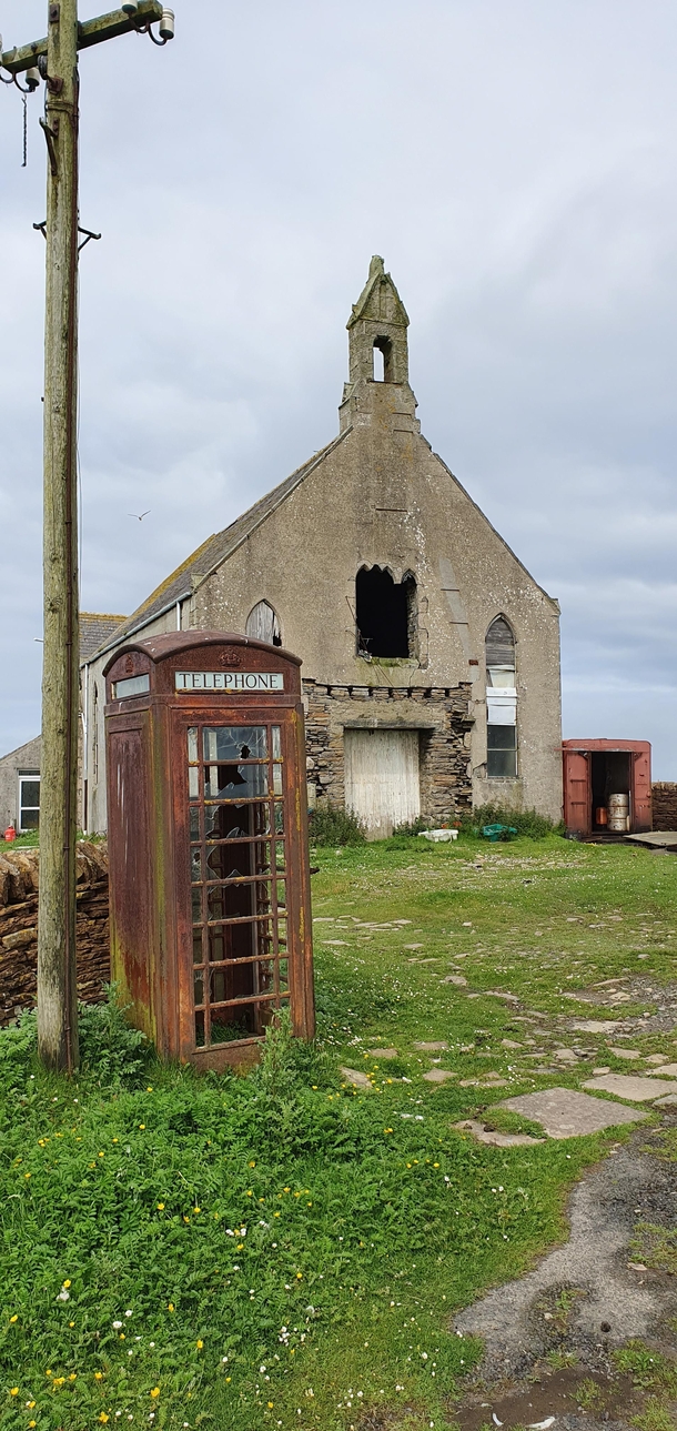 Abandoned church and telephone box Isle of Stroma Scotland