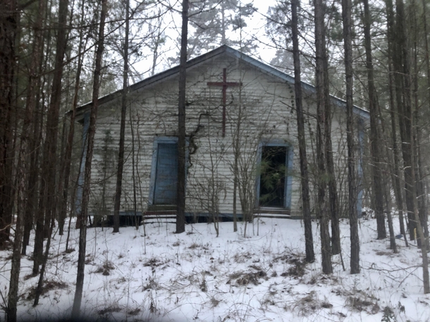 Abandoned church in rural Mississippi on land that was reclaimed by the government You couldnt see it through the pines until it snowed 